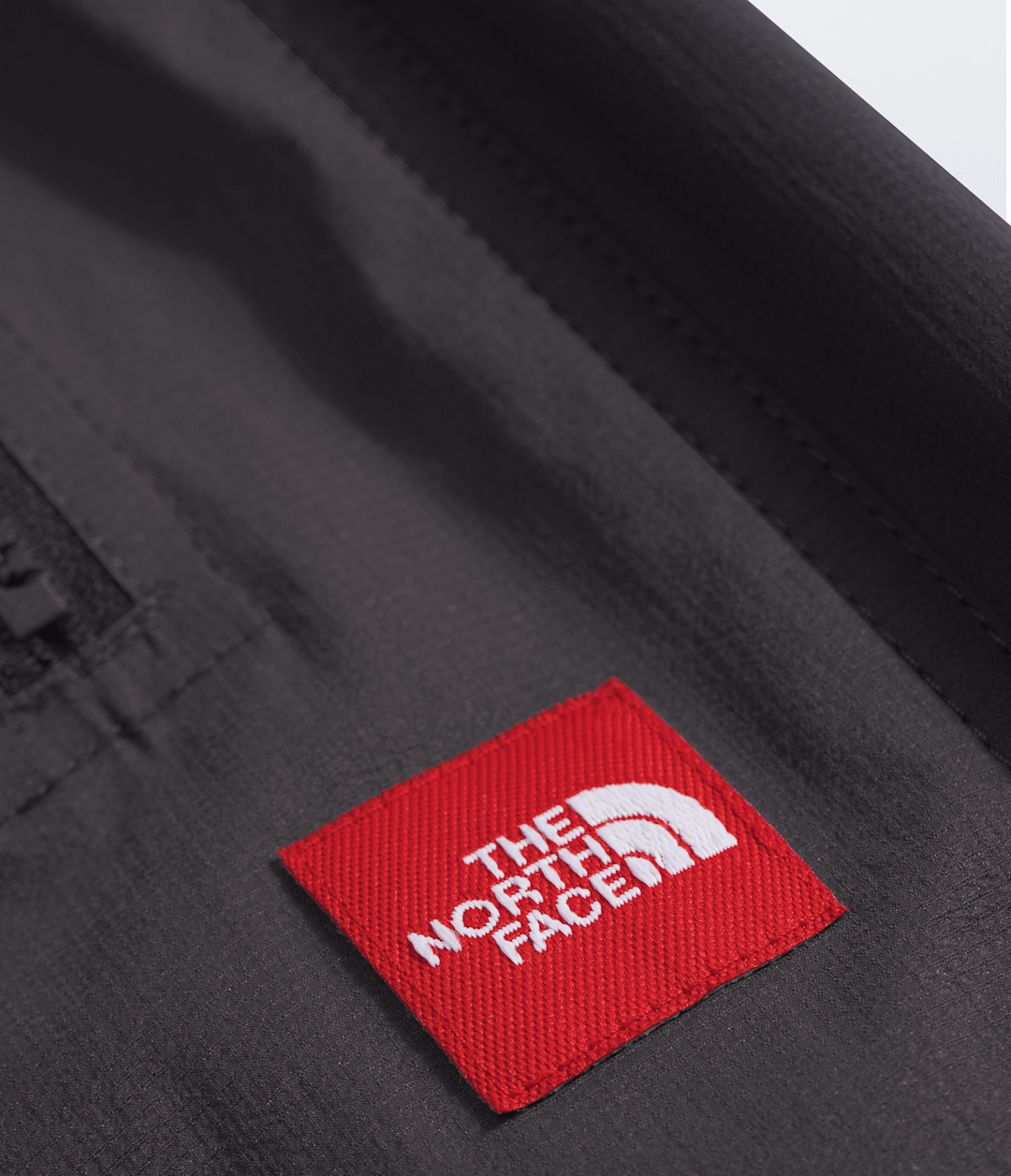 Men’s TNF™ Red Box Packable Wind Pants Obsidian